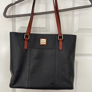 Slightly used purse. Black with drown trim and handles